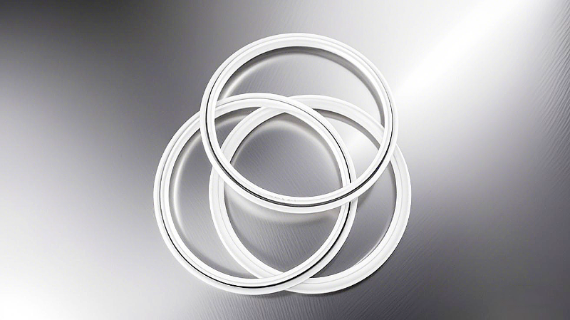 彈簧四氟密封環(huán) - 由四氟（聚四氟乙烯，PTFE） 橡膠制品，用液壓等設(shè)備中。